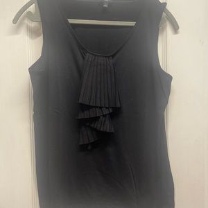 Black accordion style tank